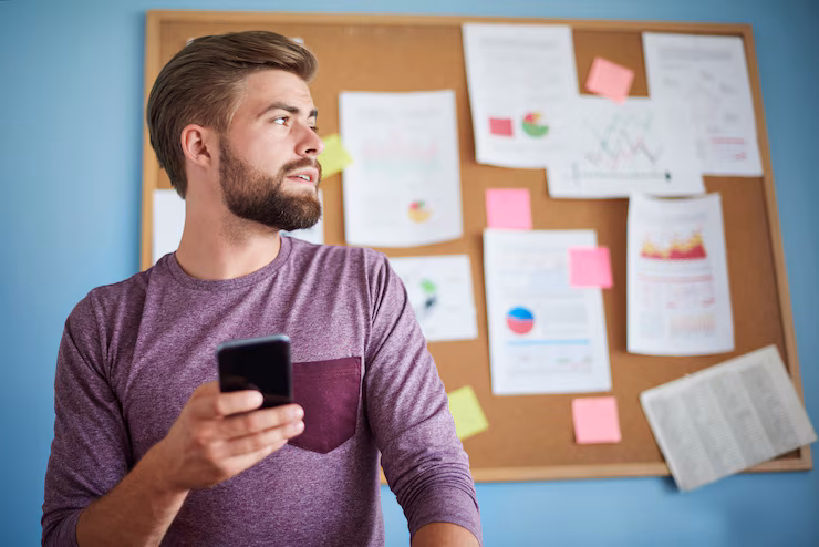 low-angle-view-man-his-home-office_329181-14542 low-angle-view-man-his-home-office_329181-14542